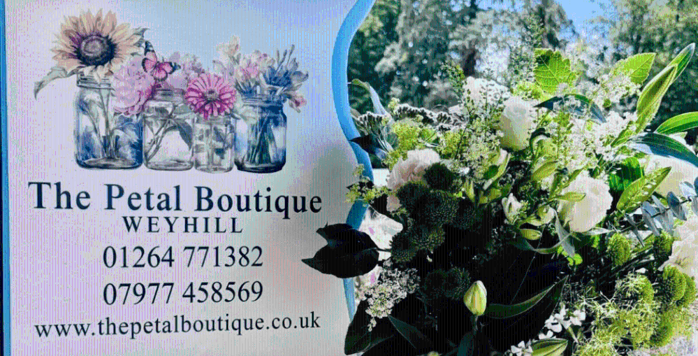 white floral display for a funeral made by Petal Boutique