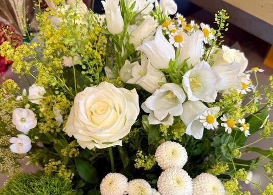 white floral display for a funeral made by Petal Boutique