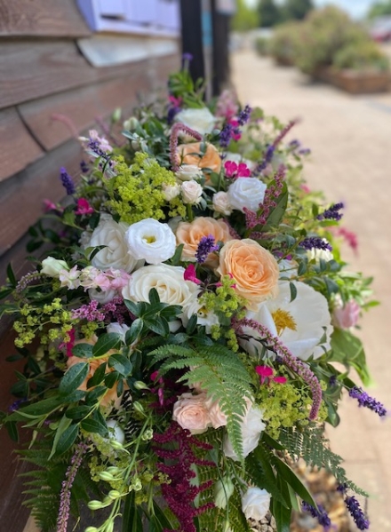 Claudius - Luxury White Casket Spray Delivery in Andover, Salisbury and Pewsey.