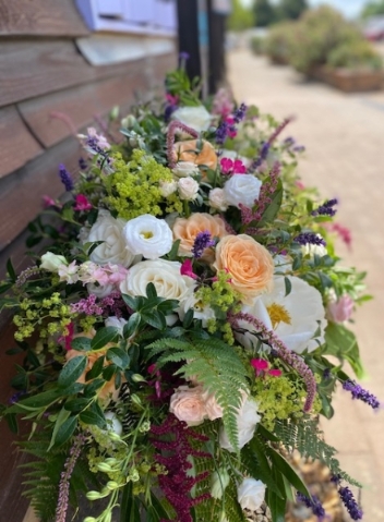 Claudius - Luxury White Casket Spray Delivery in Andover, Salisbury and Pewsey.